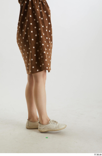 Aera  1 brown dots dress casual dressed flexing leg…